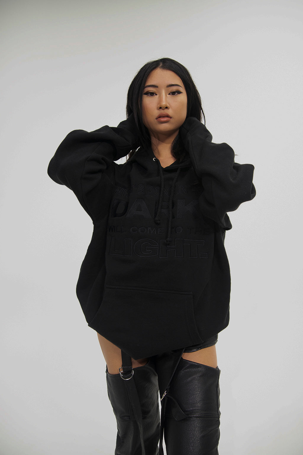 "WHAT'S DONE IN THE DARK" HOODIE