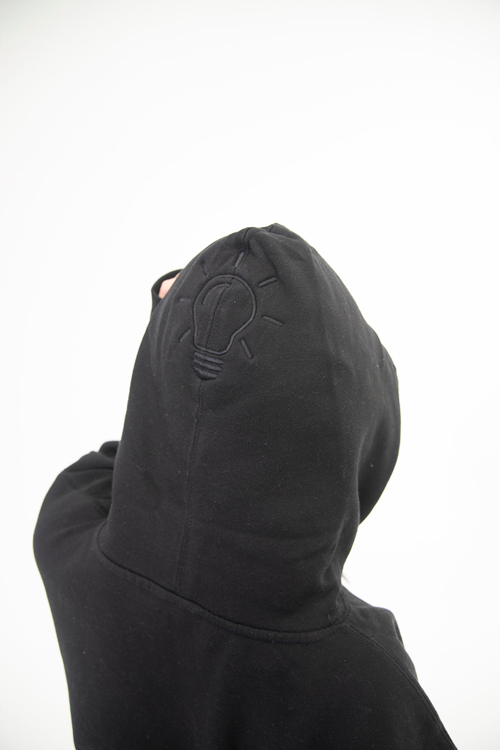 "WHAT'S DONE IN THE DARK" HOODIE